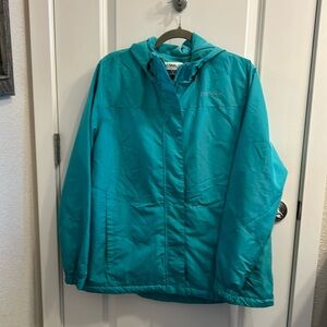 Pretty blue hooded waterproof fall jacket with lining. Magellan Outdoors. Large.